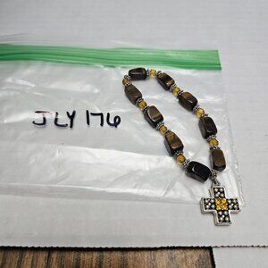 BROWN STRETCH BRACELET WITH 2 SIDED RHINESTONE PENDANT